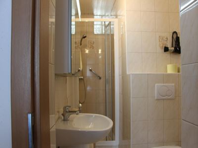 Triple room, shower or bath, toilet